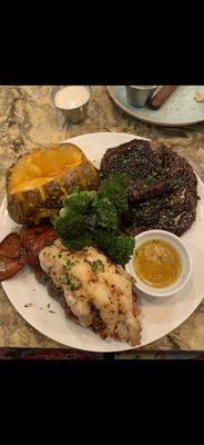 16 oz Ribeye (medium-well) and 10 oz lobster tail with sides: loaded potato and broccoli stemmed well.