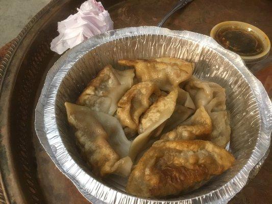 Fried dumplings with dipping sauce