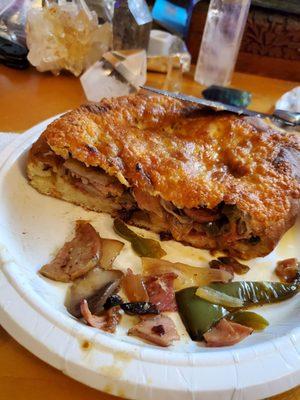 This is the Porky Pig Calzette. The smallest of three sizes of their Calzone. This is a full size paper plate.