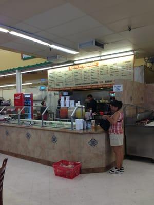 How it looks it's inside the grocery store next to the carniceria