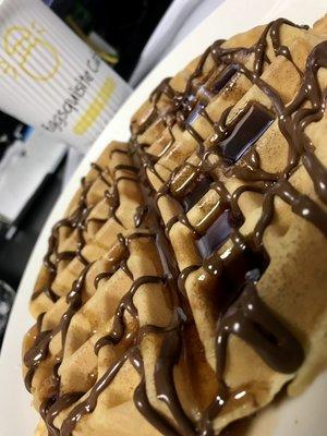 Now Open for Breakfast and Lunch - A Belgian waffle drizzled with Nutella.