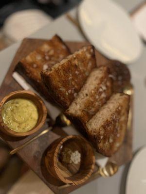 Bread with sunflower butter, honeycomb, and cheese spread... one of the best things there.