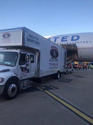 Unloading the Rams team gear before the Big Game.