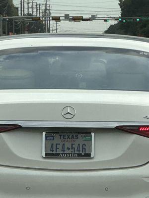 License plate of dealer driver that was recklessly driving