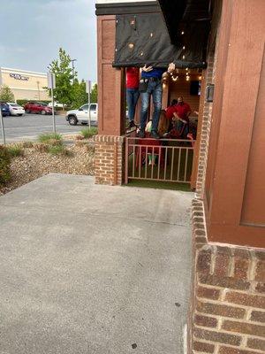 Zipping up the patio - rain's on the way.