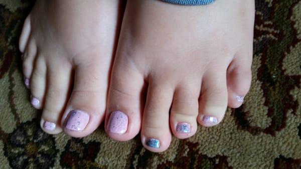 One toe has more glitter than necessary, but that's okay. =) it's a pretty color.