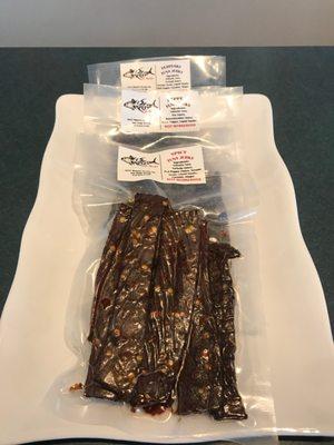 3 flavors of tuna jerky - pepper, teriyaki, and spicy ($29.95 per pound - in about 1/3 pound portions .. or about $10 a bag.)