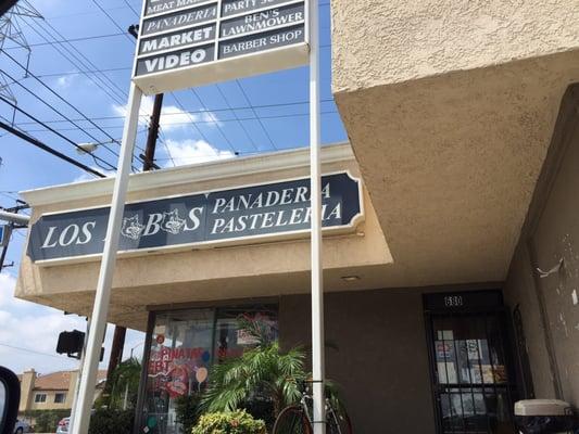 Small building attached to a barber shop on the corner of Azusa and Newburgh