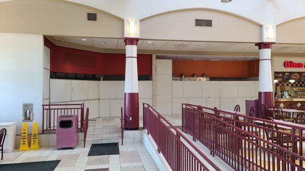 Empty food court stalls.