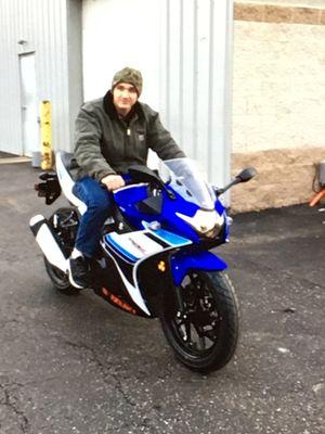 This is me on my 2019 Suzuki GSX250r right outside State 8's service department.