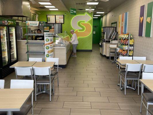 The inside of the restaurant with that signature, Subway, fresh bread smell