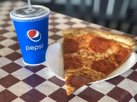 Single slice of Pepperoni Pizza and a drink