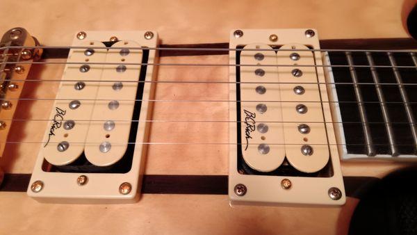 Chrome screws were not replaced with gold screws in Neck Pickup Ring.