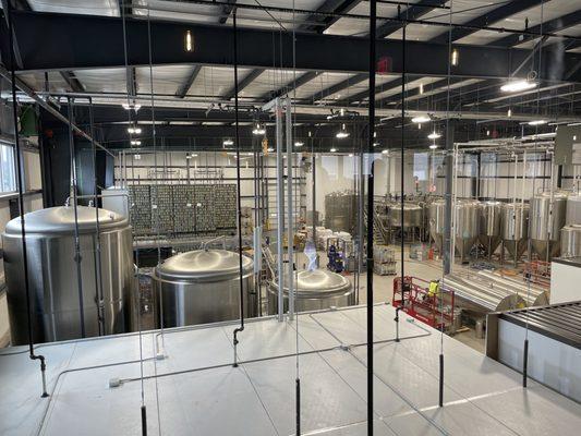 View of the production floor from the Second floor taproom window