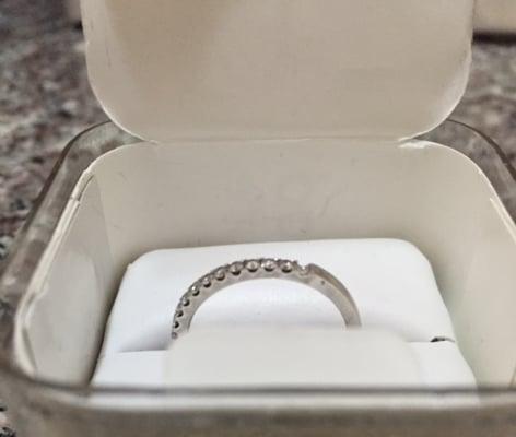 Wedding band with missing diamond. This place does not offer any warranty.