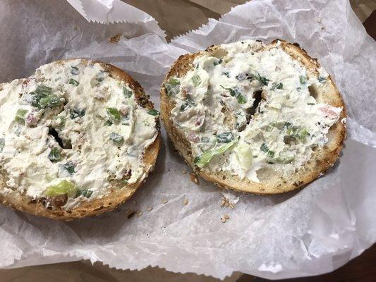 Sesames bagel toasted with green onion spreads