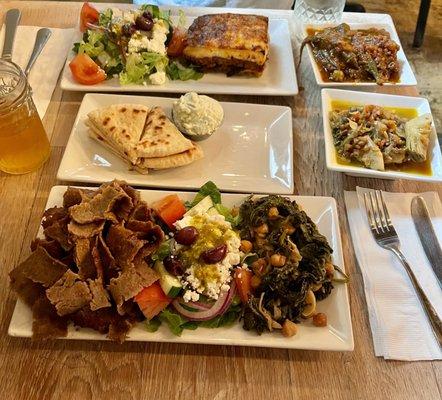 Gyro Platter with kale and chickpeas, Mousaka in the back, Okra in Tomato Sauce, Artichoke & Lentils, Pita and Tzatziki