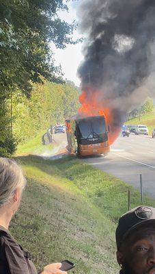 Unexplained bus fire 2 hours into trip from NY to Baltimore. No deaths. Property lost.