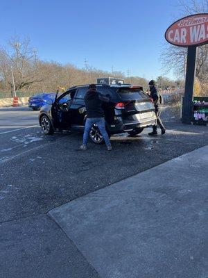 Great crew cleaning car