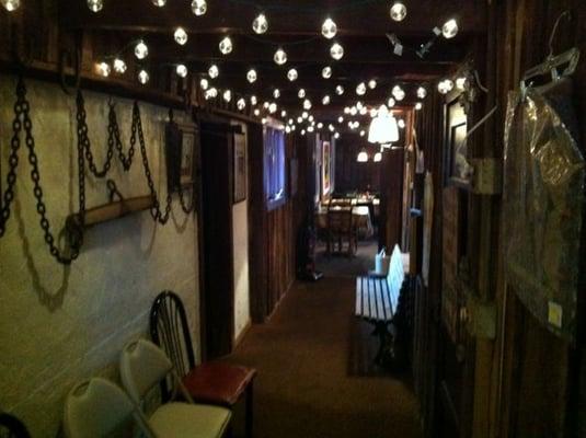 Hallway to One of three dining rooms (well, two dining rooms with one split by a fireplace).