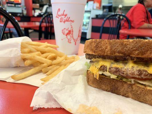 double lucky burger w/ cheese on garlic toast  no relish   sm black cherry and fries