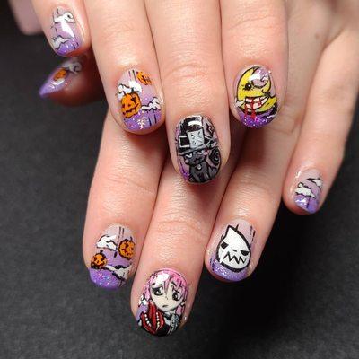 gel manicure on natural nails with anime nail art from soul eater