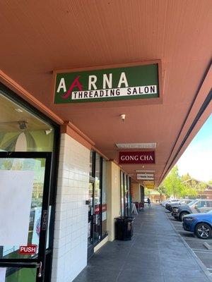 Aarna sign at strip mall