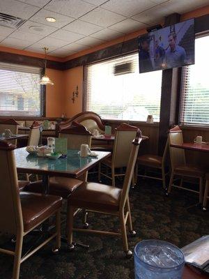 Dining area with a tv.