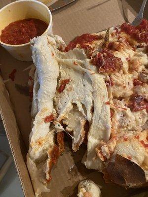 Raw dough calzone.