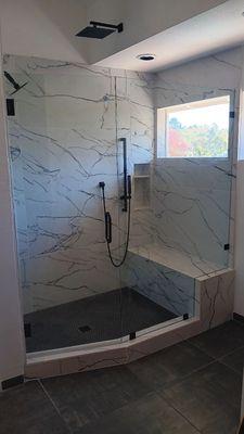 Frameless Shower Door with a 135 degree angle.