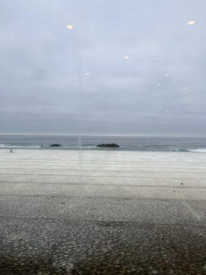 A view of the ocean out one of the large beachfront windows.