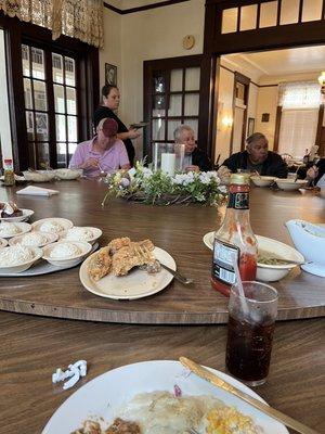 Food is served family style on a large lazy Susan. Be ready to "spin the wheel!"