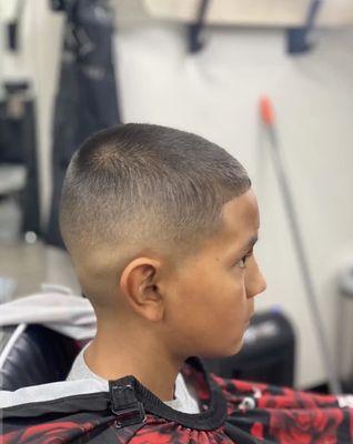 Bald fade with a 3 on top, and a line up.