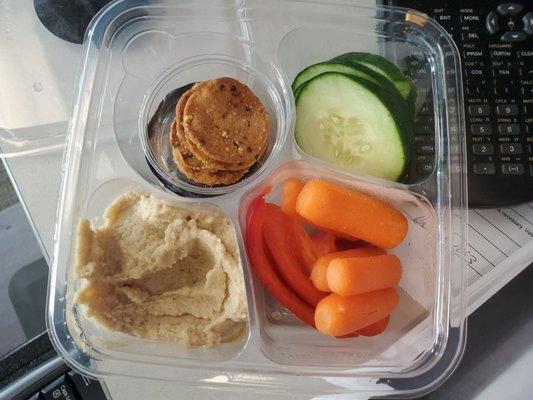 Roasted garlic hummus with veggies and GF crackers.