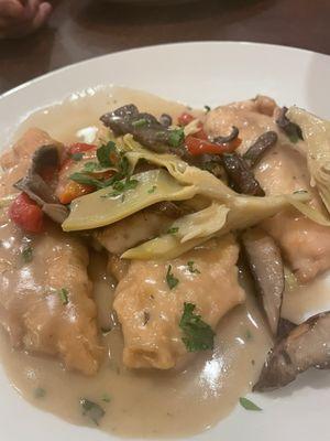 Chicken AMARI with portabello mushrooms, roasted red peppers and artichoke hearts cooked in a rich brandy cream sauce.