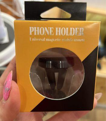 The woman threw in a Phone Holder Universal Magnetic Mobile Mount we'll take advantage of on road trips!