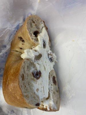 Walnut raisin cream cheese in a raisin bagel