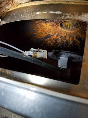 Rust from leaky tank on hot water heater.