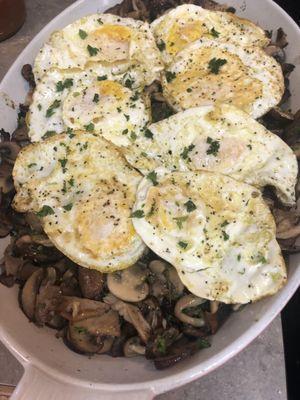 Basque mushroom dish with fried eggs and fresh thyme