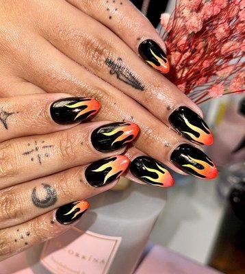 "Turning up the heat with this fiery ombre flame design!  #HotNails"

By Nancy