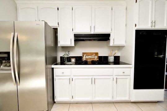 black granite counter tops look great with the white cabinets