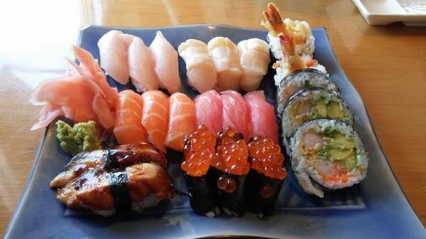 Top row: yellowtail, scallop Middle row: salmon, tuna, spicy shrimp tempura  Bottom row: eel, salmon roe