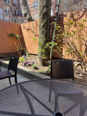 Very cute backyard dining area