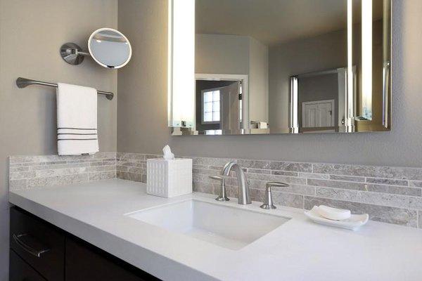 Gorgeous stain, mold and mildew-resistant quartz vanity top.