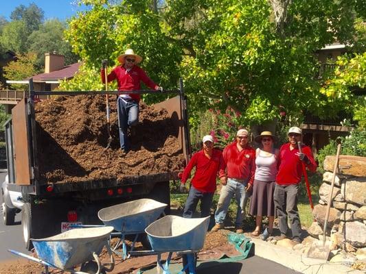 Our crew helping mulch a long time maintenance clients property. Helping to cut down on water usage and add to soil health.