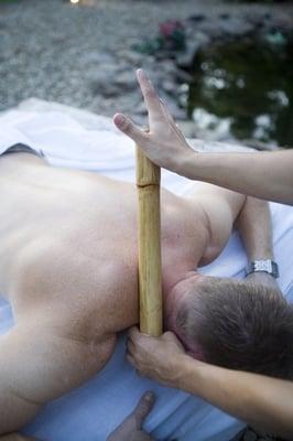 Heated Bamboo to warm the muscles and relieve chronic pain.