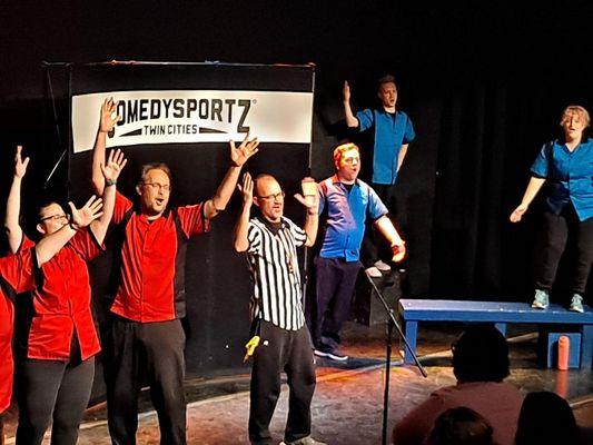 Two teams battle it out in improv comedy based on your suggestions. Fast paced and funny!