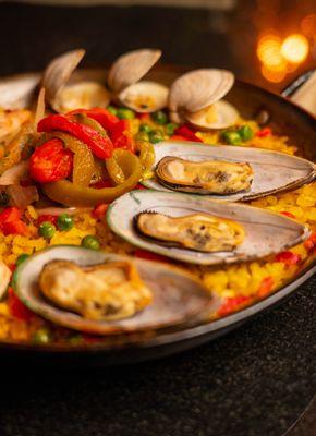 Paella - Chorizo, Shrimp, Mussels, Clams, Saffron rice, Bell Pepper Salad