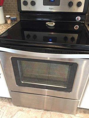 Stove repair service in Spokane WA. This whirlpool glass top burner was broken, now its fixed.