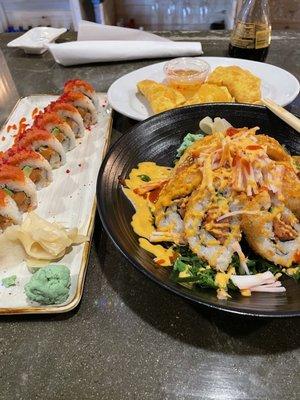 Death by Sushi on the left, hot volcano roll on the right and crab Rangoon in the back!